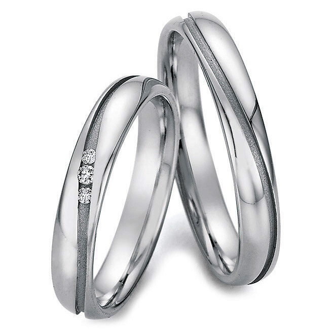 Eheringe Edelstahl mit außergewöhnliche Fuge Brillant 0.040 ct. Ruesch 88/22050 & 88/22060